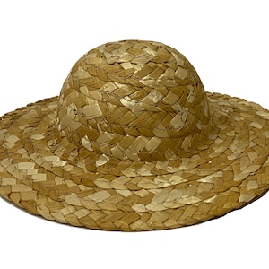 May include: A wide-brimmed straw hat with a woven design. The hat is light brown and has a rounded crown.
