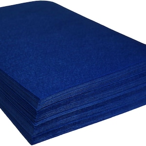 May include: A stack of royal blue felt sheets. The felt is smooth and has a slight sheen.