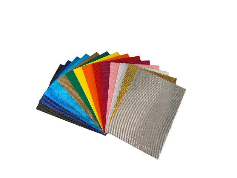 May include: A fan-shaped arrangement of 14 sheets of corrugated cardboard in various colors, including black, blue, green, yellow, orange, red, pink, white, gold, and silver.