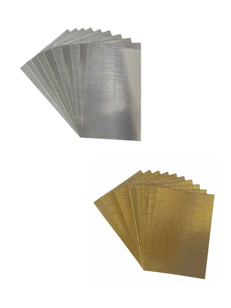 May include: Two stacks of decorative metallic placemats. One stack is silver and the other is gold. Each stack has 10 placemats.