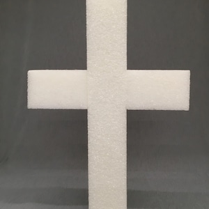 Könnte beinhalten: Ein weißes Schaumstoffkreuz, perfekt zum Basteln und Dekorieren.