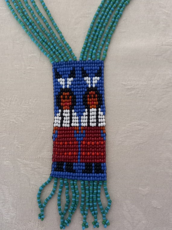 Navajo Seed Bead Necklace with 2 Indian Natives