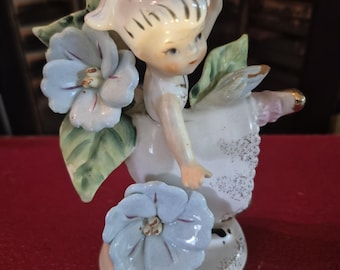 Figura vintage de Josef Originals, niña de cumpleaños de septiembre, ángel de porcelana japonesa con flores.