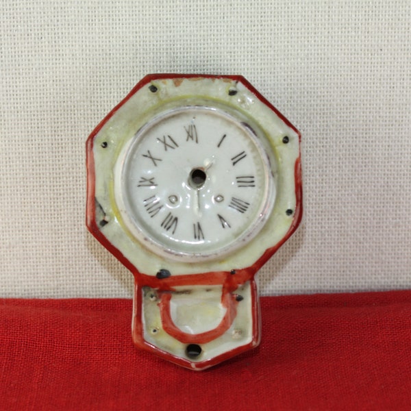 Japanese antiques, a small Porcelain figurine calligraphy tool suiteki around 1868-1900, a very nice wall clock design