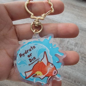 Hydrate or Die Magikarp Double Sided Holographic Acrylic Charm Keychain