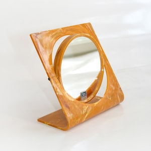 Small Round Vintage West German Marbled Orange Tabletop Vanity Mirror Magnifying Eames Era Mid Century Modern Retro Accent Painterly Swirled