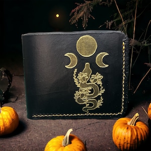 Cartera plegable de piel con serpiente negra y dorada