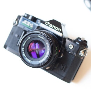 Near Mint Canon AE-1 Program Black | 35mm Camera Kit | Ready to Shoot | 50mm F1.8 Lens |