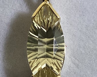 Oregon sunstone concave cut champagne pendant in custom 14kt gold setting!