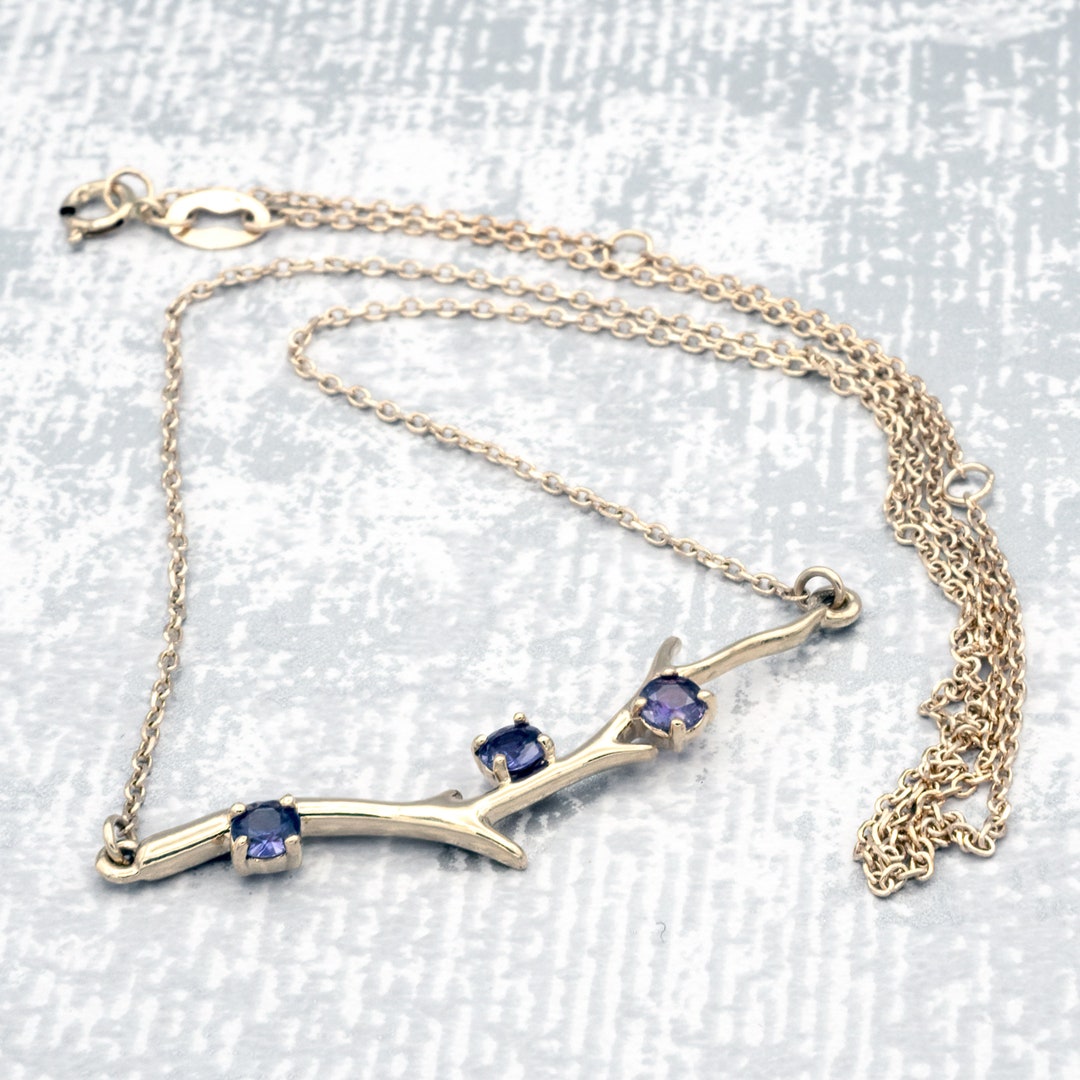 Rare Natural Purple Yogo Sapphires Set in 14k Yellow Gold Branch