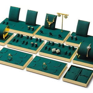Ensemble de présentoir à bijoux vert en microfibre : organisateur de salle d'exposition avec base en métal