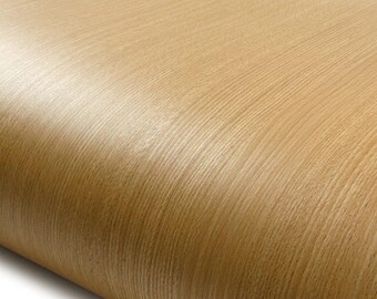 May include: A light tan wood grain surface with a smooth, curved edge. The material features a consistent, linear pattern of vertical wood fibers in shades of beige and light brown, creating a natural texture with a subtle sheen across the surface.