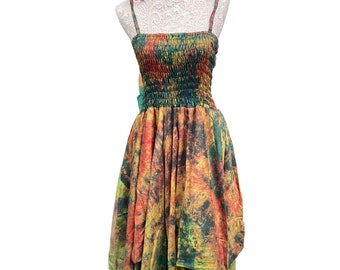 May include: A colorful, tie-dye, sleeveless dress with a gathered bodice and a flowing, asymmetrical hemline.