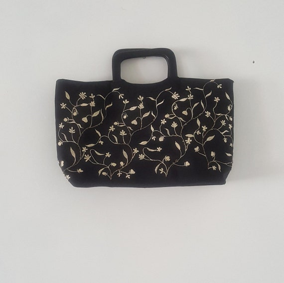 Handbag, embroidered fabric with wooden handles