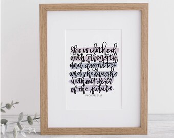 Proverbs 31:25 | She is Clothed with Strength and Dignity | Bible Verse Wall Art - Calligraphy Print With Mat