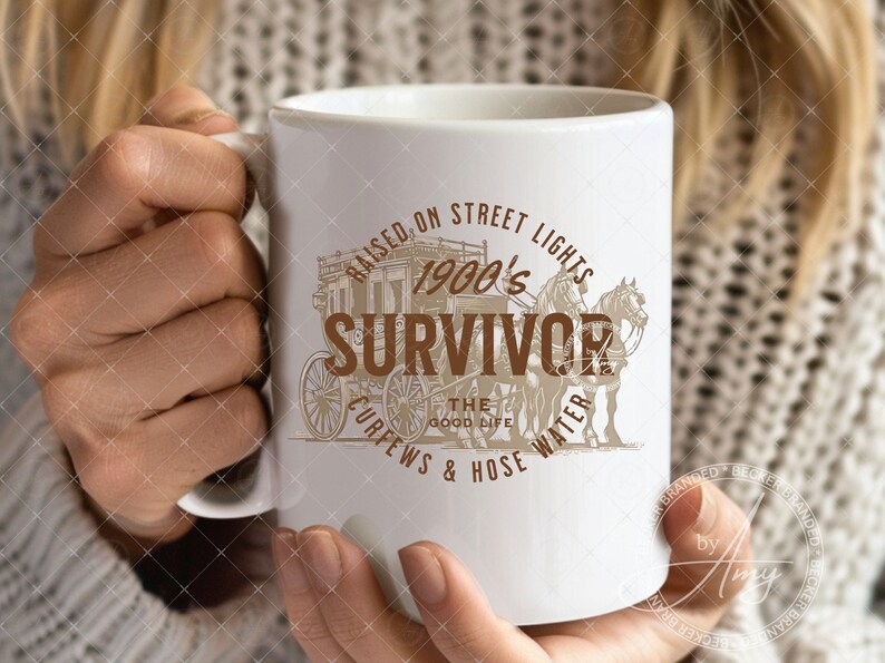 May include: White ceramic mug with a brown graphic design featuring a horse-drawn carriage and the text "Raised on Street Lights 1900's Survivor Curfews & Hose Water The Good Life".