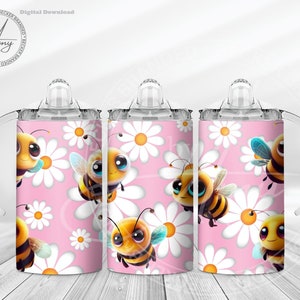 May include: Three pink and white daisy patterned stainless steel tumblers with clear lids and handles. Each tumbler features a cartoon bee with big eyes and a yellow and black striped body.