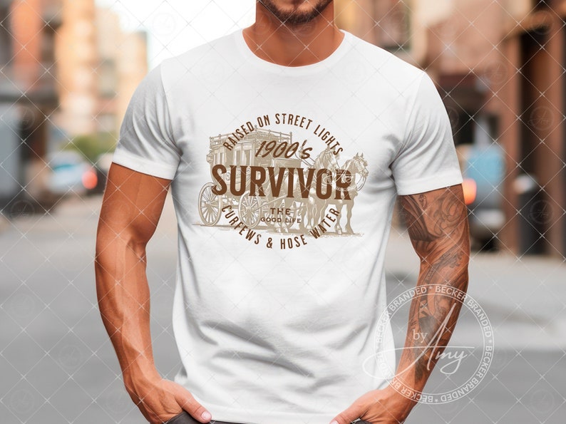 May include: A white t-shirt with a brown graphic design featuring a horse-drawn carriage and the text "Raised on Street Lights 1900's Survivor The Good Life Curfews & Hose Water".
