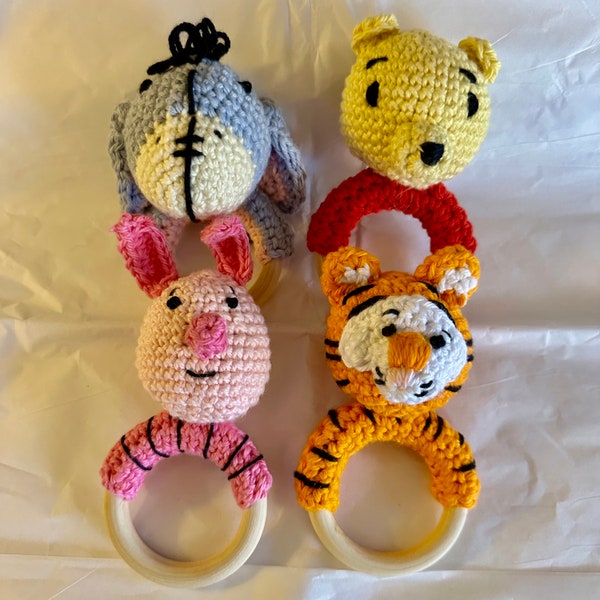 Winnie the Pooh, Eeyore, Piglet and Tigger inspired all natural rattles.