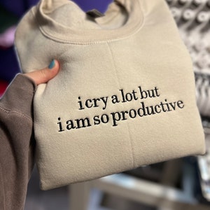 I cry a lot but I am so productive Embroidered Crewneck, TTPD merch image 2