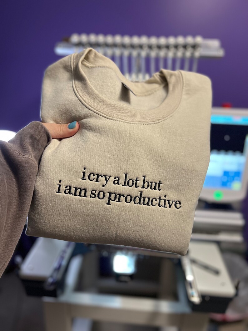 I cry a lot but I am so productive Embroidered Crewneck, TTPD merch image 1