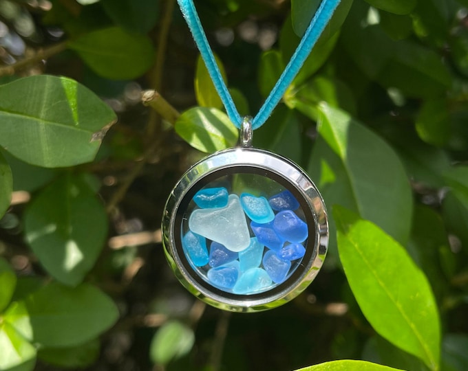 Blue Sea.  Locket filled with Genuine English Sea Glass Heart, various blues and multis on Sterling Silver Necklace.