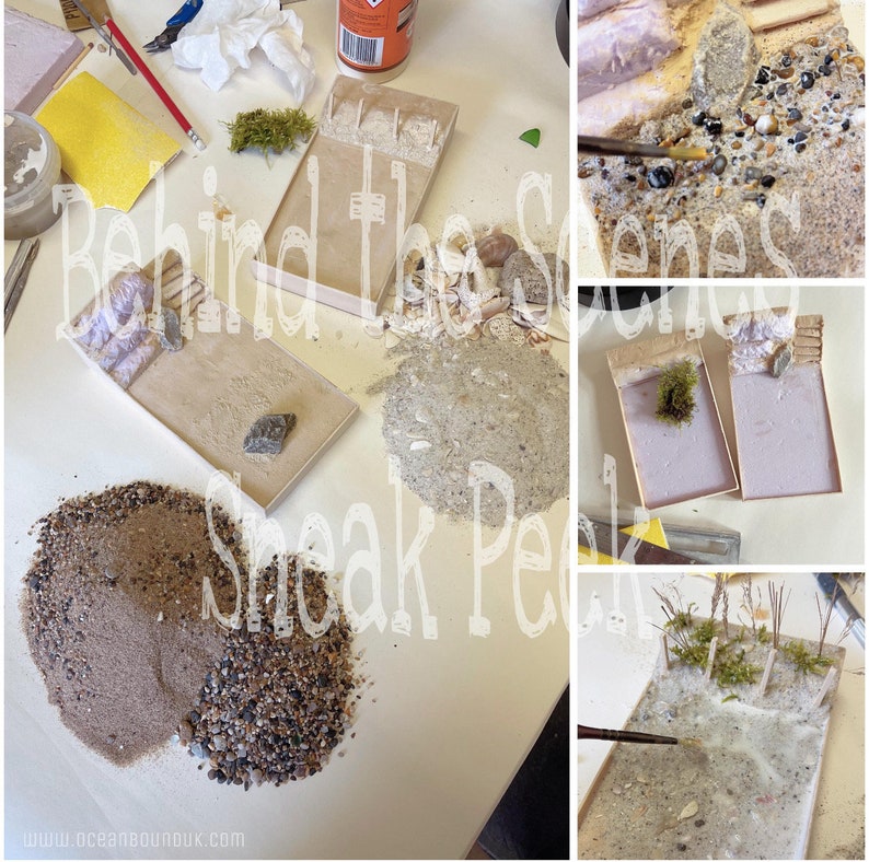 May include: A close-up of a miniature beach scene being created. The scene includes sand, rocks, and a small wooden walkway. The text "Behind the Scenes Sneak Peek" is visible in the image.