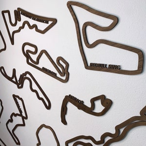 Formula One circuits collection wall display. Perfect scale versions of the complete F1 calendar available in different sizes and colours.