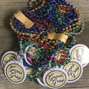 Mardi Gras Beads with custom sticker on a white plastic medallion, multi colored mardi gras beads packs of 12