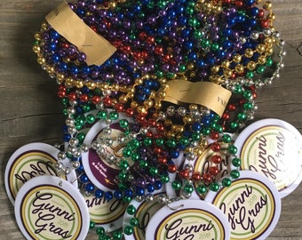 Mardi Gras Beads with custom sticker on a white plastic medallion, multi colored mardi gras beads packs of 12