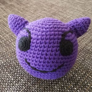 Crochet figure Ball Smiling face with horns