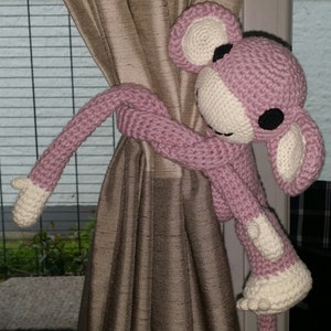 Cuddly toy Amigurumi monkey in pink