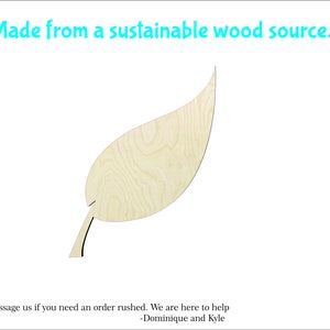 May include: A light brown wooden leaf cutout. The leaf is made from a sustainable wood source. The text "Made from a sustainable wood source." is at the top of the image. The text "Message us if you need an order rushed. We are here to help -Dominique and Kyle" is at the bottom of the image.