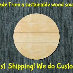 May include: A round wooden sign with a light wood grain finish. The sign has five horizontal lines across the surface. The sign is made from a sustainable wood source. The text "Made From a sustainable wood source" is written in yellow at the top of the image. The text "Fast Shipping! We do Custom!" is written in yellow at the bottom of the image.