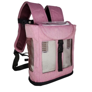 May include: A pink pet carrier backpack with a mesh window and a clear plastic window on the top. The backpack has adjustable straps and a buckle closure.