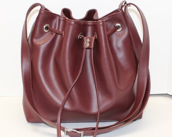 maroon leather bag