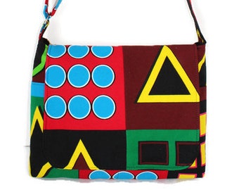 African print messenger bag with pockets, adjustable strap and magnetic snap closure
