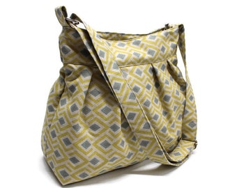 Canvas handmade crossbody shoulder bag with zip closure, adjustable strap and inside pockets