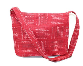 Women canvas messenger crossbody bag with inside pockets and adjustable strap, magnetic snap closure