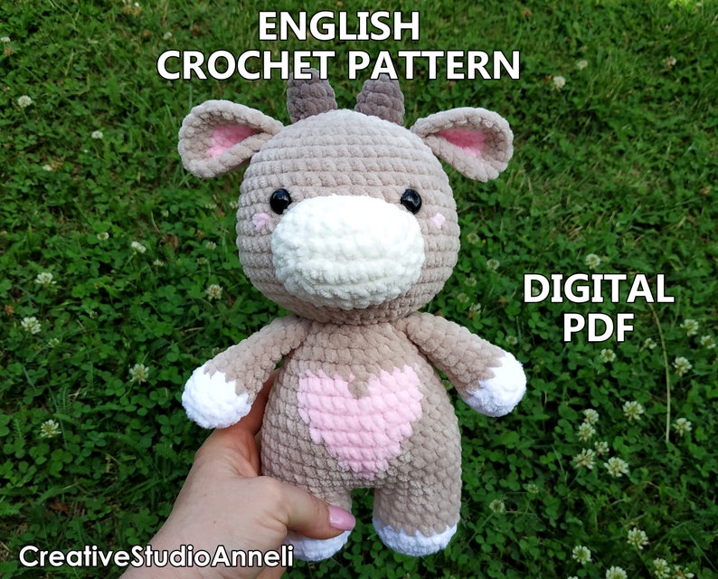 May include: Crochet pattern for a plush brown and white cow with pink accents. The pattern is available as a digital PDF download.  ENGLISH CROCHET PATTERN DIGITAL PDF