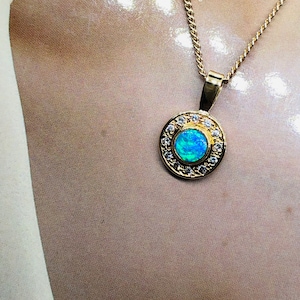 Opal and diamond pendant