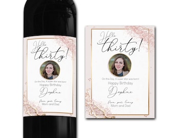 Puede incluir: Una etiqueta de botella de vino rosa y dorada con una foto de una persona y el texto "Hello Thirty!"  On this Day, A super star was born! Happy Birthday Daphne from your loving Mom and Dad.