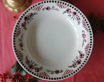 Hollow round dish in iron earth, red and black décor, old dish