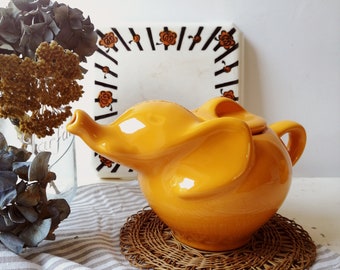 Elephant teapot, vintage advertising ceramic yellow teapot