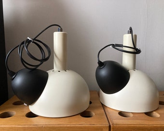 Pair of vintage 1970s Sijaj Hrastnik pendant lamp made in Yugoslavia.