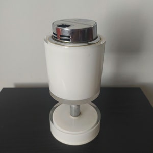 Postmodern Lucite white and chrome table lighter - Vintage 1970s Lucite white table lighter by Sarome Japan.