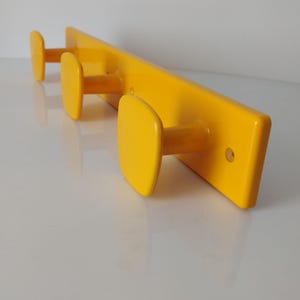 Vintage 1970s Yellow Plastic Wall Hanger Mid Century Modern Towel/Coat Hook