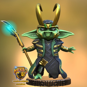 May include: A green and gold figurine of a character with horns, a green robe, and a staff. The character is holding a staff with a glowing blue tip. The figurine is on a gold base with a decorative pattern.
