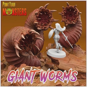 May include: A 3D-printed miniature scene featuring two large, brown giant worms with open mouths and a female warrior figure. The worms have sharp teeth and a textured appearance. The scene is set on a rocky terrain, with the text "GIANT WORMS" at the bottom.