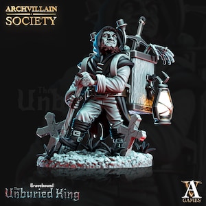 May include: A detailed figurine of "The Unburied King" from the Archvillain Society. The figure is dressed in a hooded cloak and carries a lantern and a wooden staff. The base features a graveyard scene with tombstones.